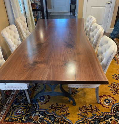 Live Edge Walnut Bookmatch dining table with cast iron base